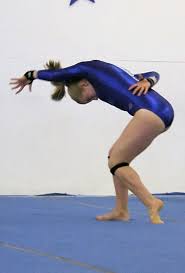 Gymnast pose after xcel floor