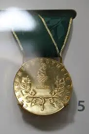 magnificent seven gold medal