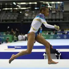 gymnast performing vault run
